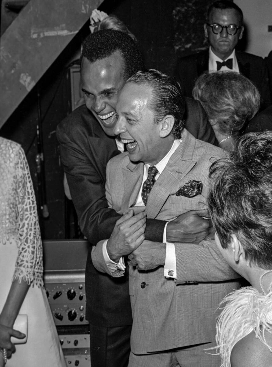 Harry Belafonte hugs Don Knotts after performing at Caesars Palace on Sept. 14, 1967, in Las Ve ...
