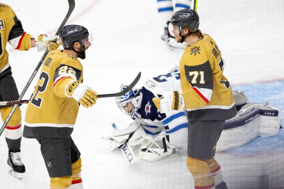 Golden Knights right wing Michael Amadio (22) and center William Karlsson (71) celebrate after ...