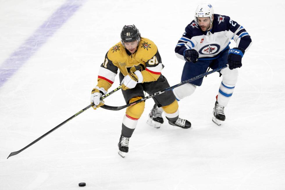 Golden Knights right wing Jonathan Marchessault (81) skates for the puck against Winnipeg Jets ...