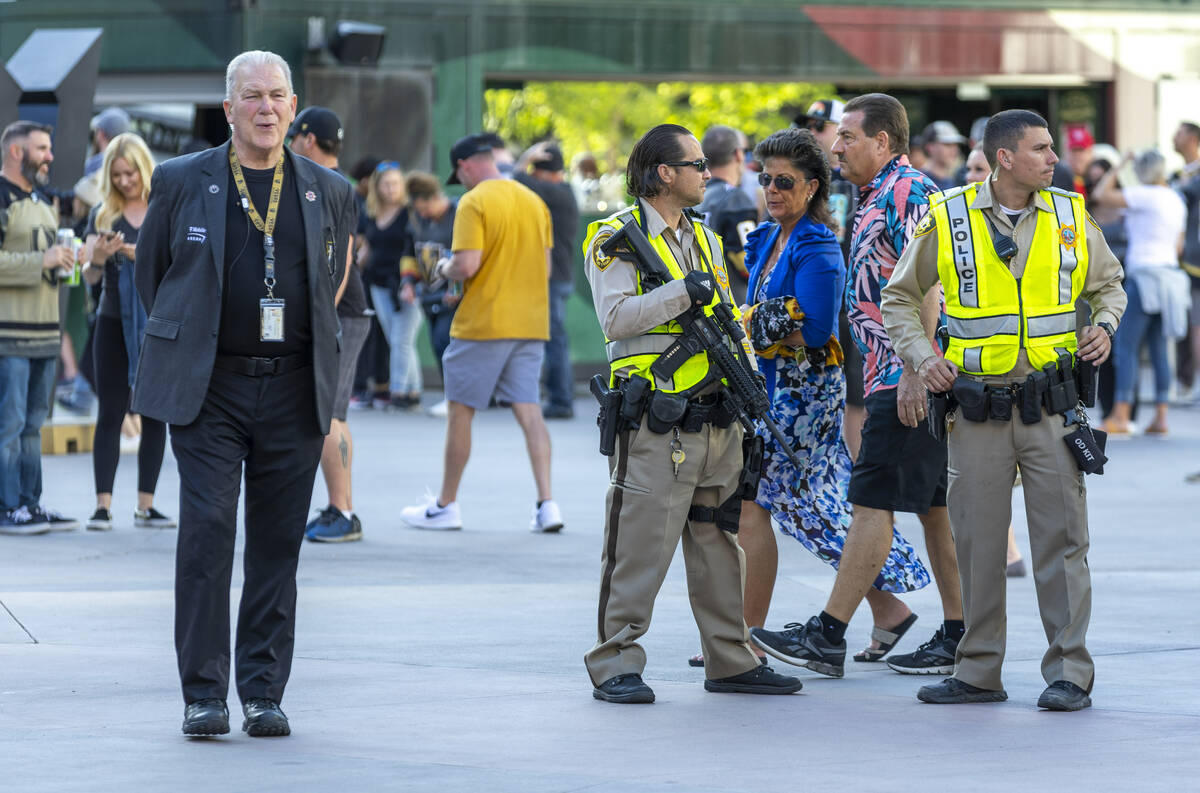 Metropolitan Police Department officers stand watch outside before Game 5 of an NHL hockey Stan ...