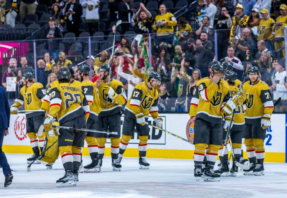 Golden Knights defenseman Alec Martinez (23) wipes his eyes after he and teammates defeat the W ...