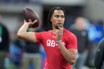 Ohio State quarterback CJ Stroud runs a drill at the NFL football scouting combine in Indianapo ...