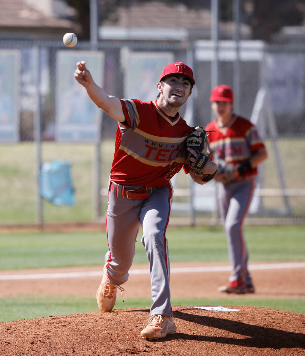Southeast Career Tech's Luke Hughes (2) throws a ball to first base during the first inning of ...