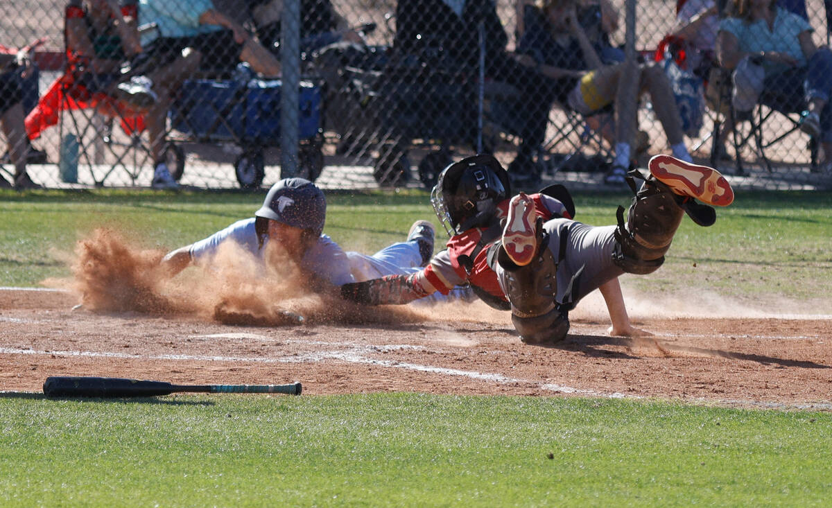 Foothill's Tyler Straily (16) is tagged out by Southeast Career Tech's Bruce Trzpis (5) at home ...