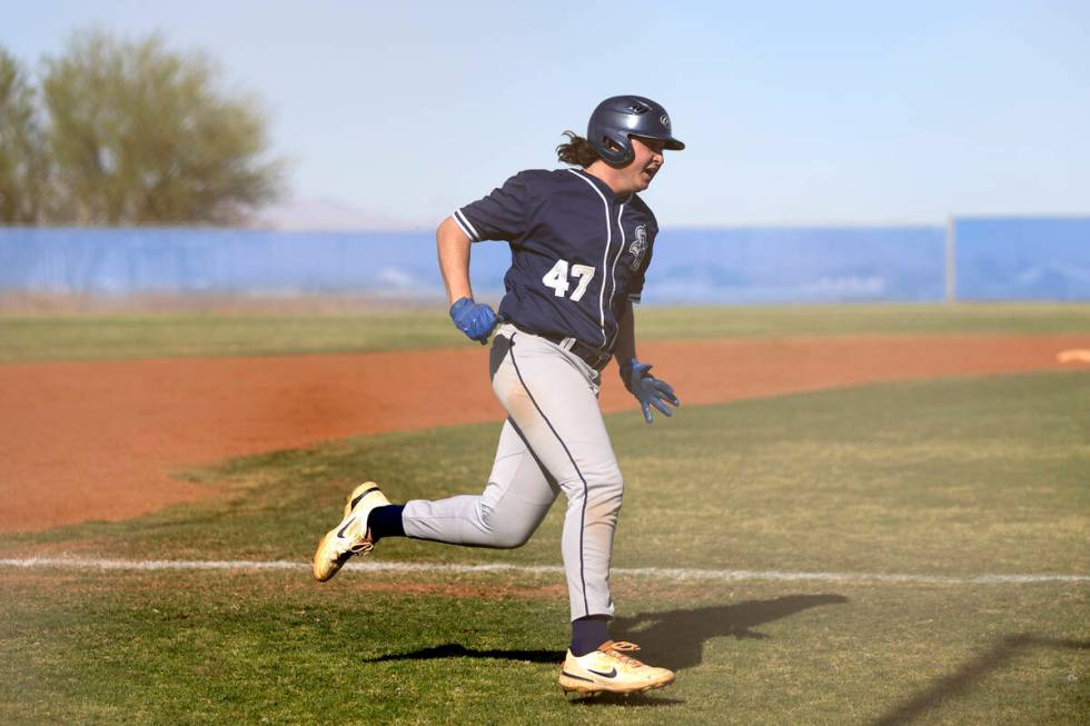 Sierra Vista’s Ian Grafmank rounds first base before scoring an RBI during a Class 4A hi ...