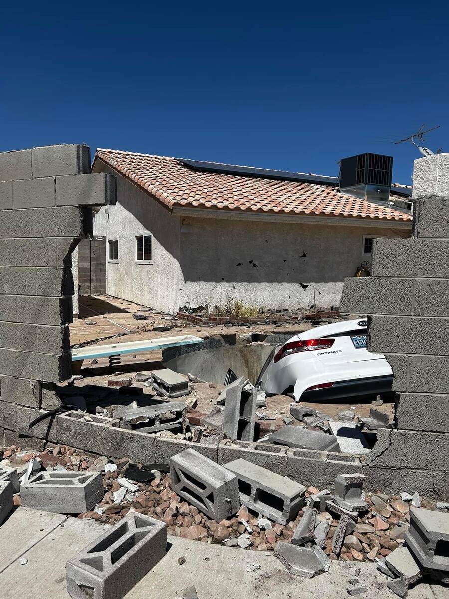 A Kia plowed through a brick wall and into the backyard of a home in central Las Vegas on Wedne ...
