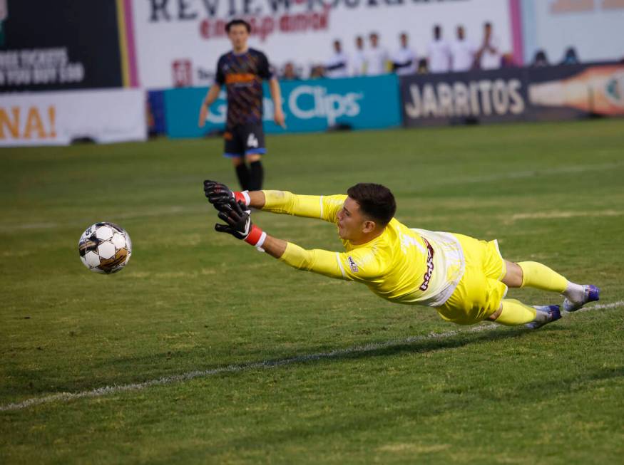 Las Vegas Lights FC goalkeeper Leo Diaz (1) makes a diving save against Real Salt Lake during t ...