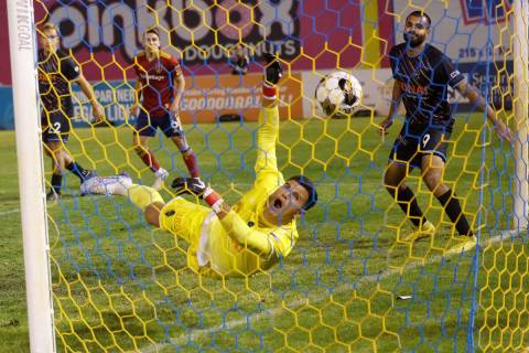 Las Vegas Lights FC goalkeeper Leo Diaz (1) dives but fails to save the goal from Real Salt Lak ...