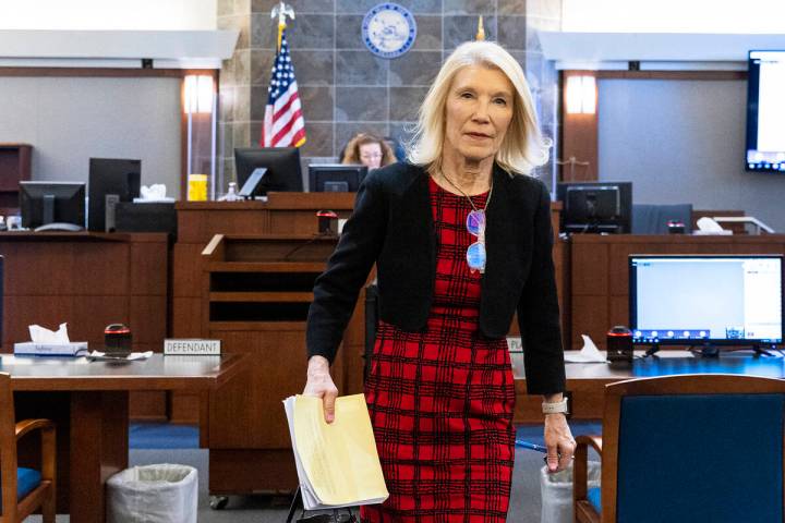 Attorney Alice Denton leaves the courtroom after a hearing at the Regional Justice Center, on T ...