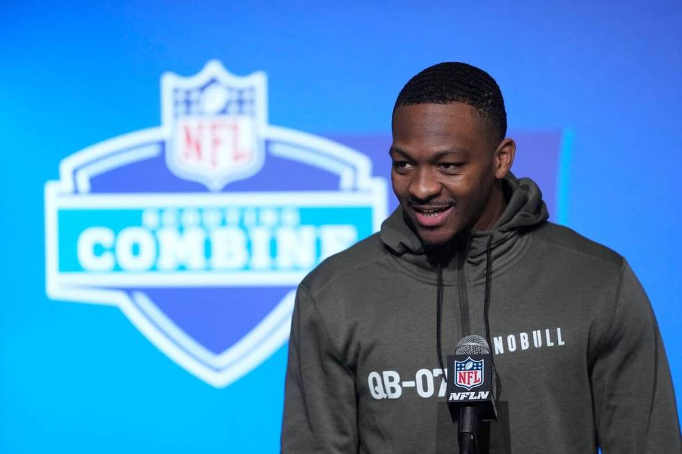 FILE - Tennessee quarterback Hendon Hooker speaks during a news conference at the NFL football ...