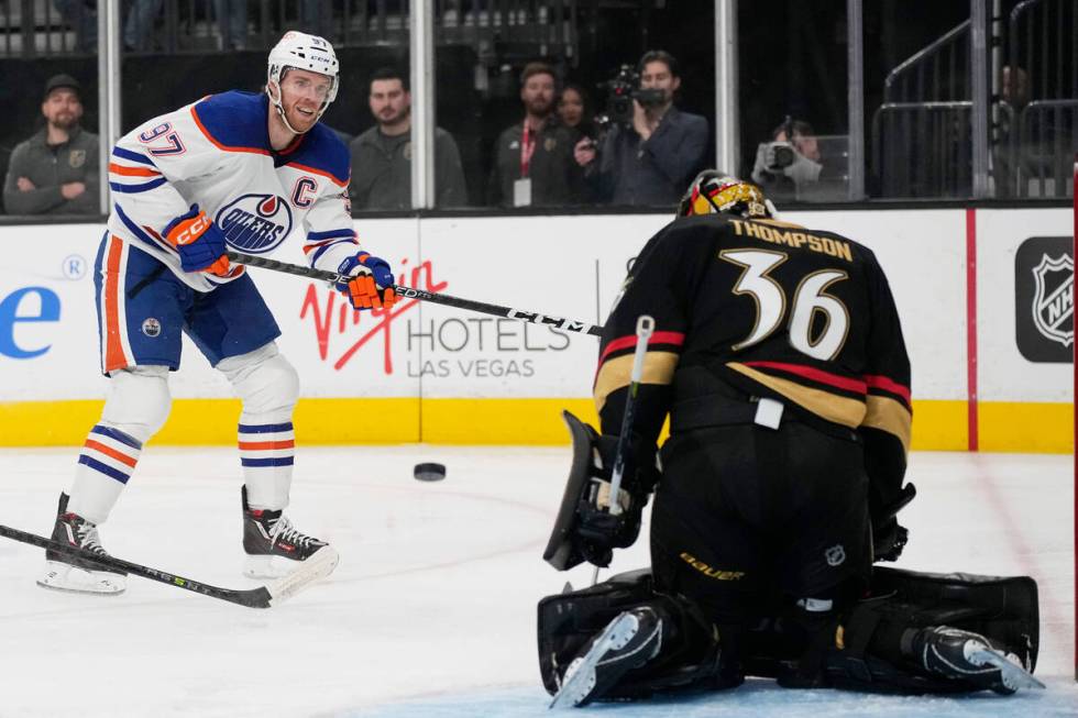 Edmonton Oilers center Connor McDavid (97) shoots on Vegas Golden Knights goaltender Logan Thom ...