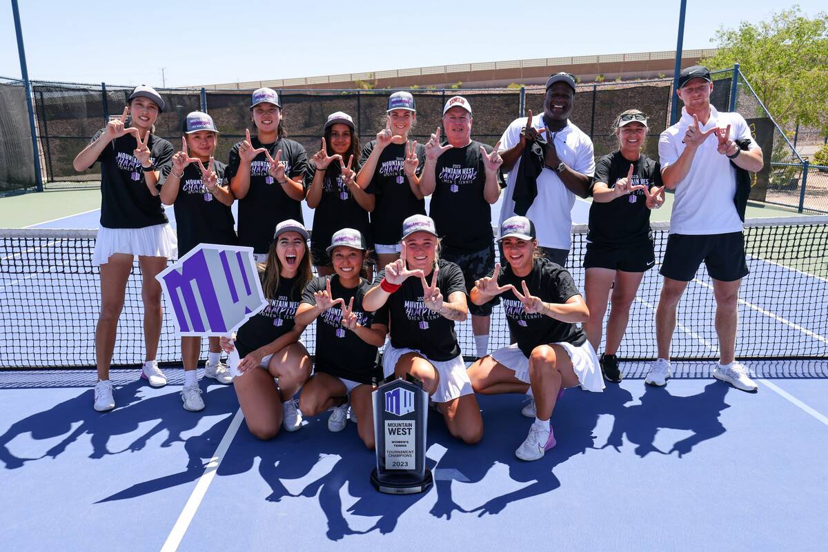 The UNLV women’s tennis team poses with the Mountain West tournament championship trophy on S ...
