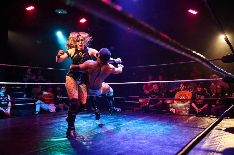 Bryn Thorne, left, slams down Keita, right, at the Hope to Die show organized by PrideStyle Pro ...