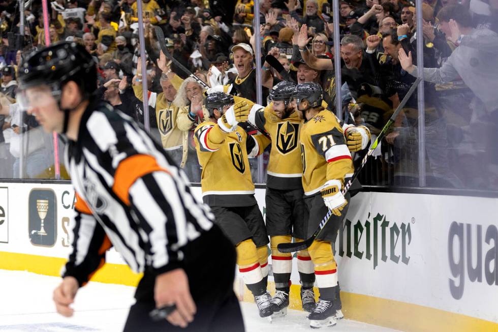 Golden Knights right wing Reilly Smith, left, right wing Michael Amadio, center, and center Wil ...