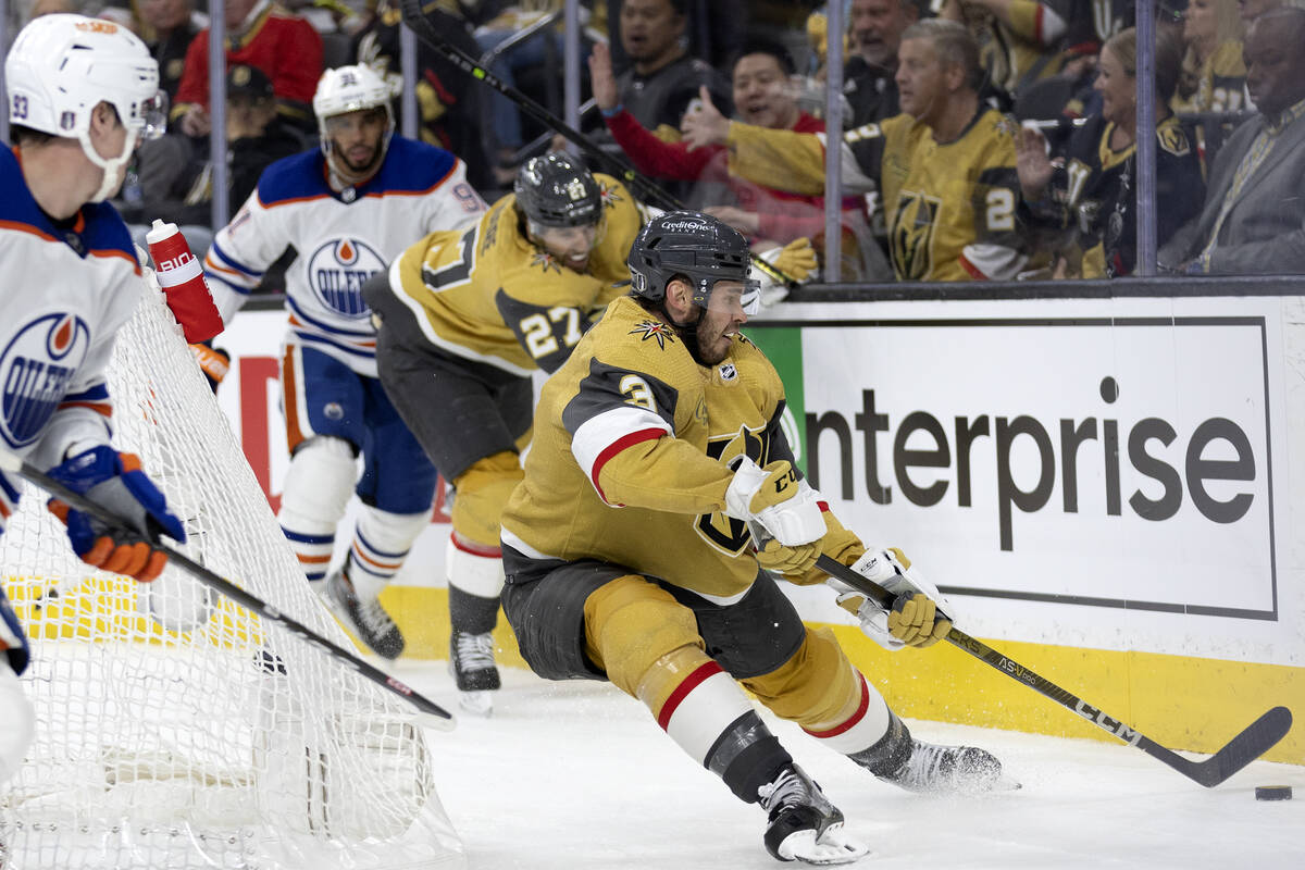 Golden Knights defenseman Brayden McNabb (3) snags the puck from the Edmonton Oilers during the ...