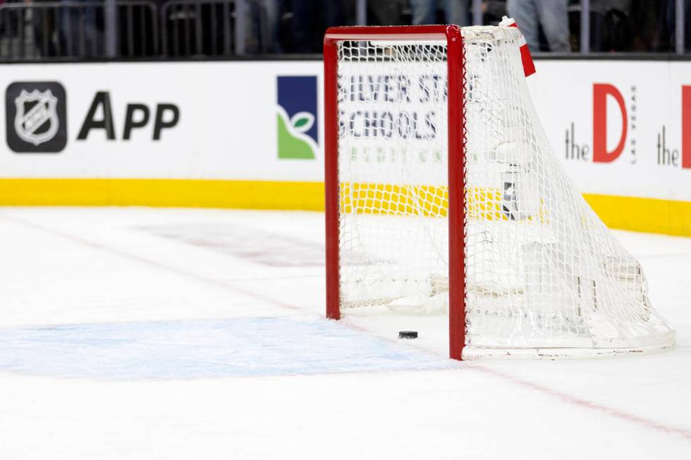 Golden Knights center Jack Eichel, out of frame, scores on the Edmonton Oilers’ empty ne ...