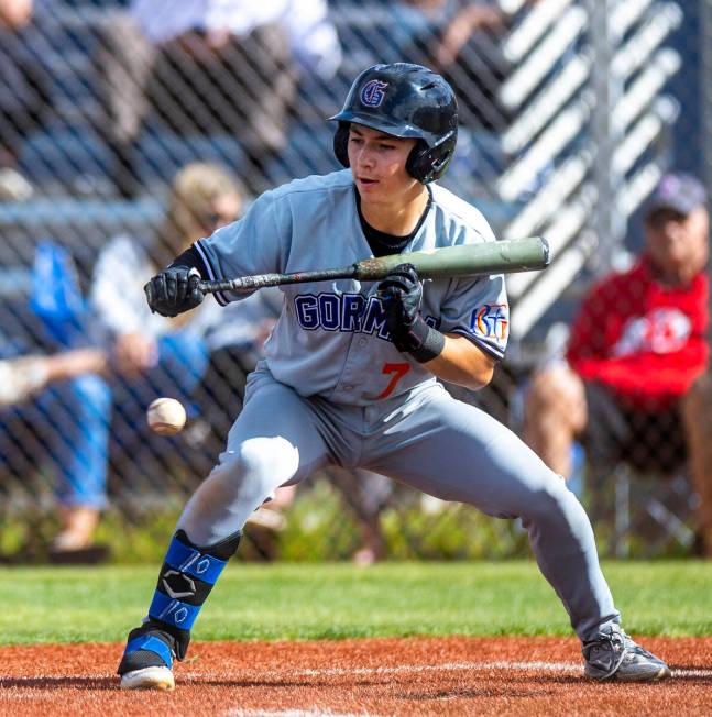 Bishop Gorman batter Colton Boardman (7) bunts against Centennial during the fourth inning of t ...