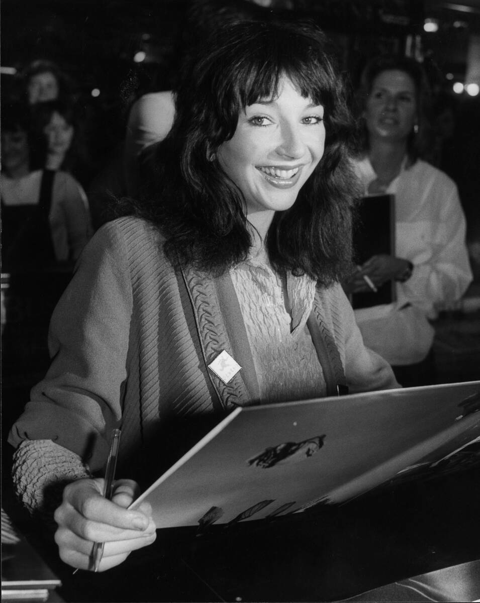 Singer Kate Bush signing copies of her latest album 'Never Forever' at the Virgin Mega Store, L ...