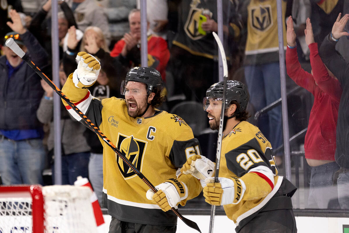 Golden Knights right wing Mark Stone (61) and center Chandler Stephenson (20) celebrate after s ...