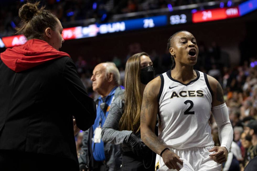 Las Vegas Aces guard Riquna Williams (2) celebrates after scoring a key 3-point goal during the ...