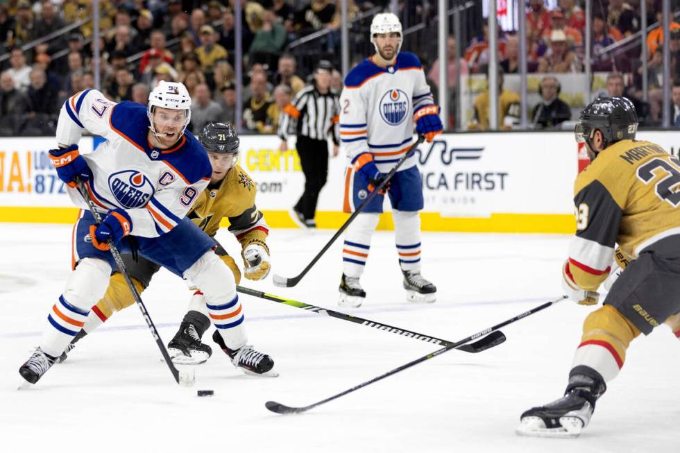Edmonton Oilers center Connor McDavid (97) skates with the puck against Golden Knights center W ...
