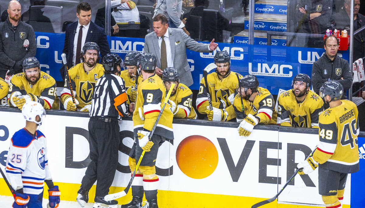 Golden Knights head coach Bruce Cassidy argues another penalty call as they battle the Edmonton ...