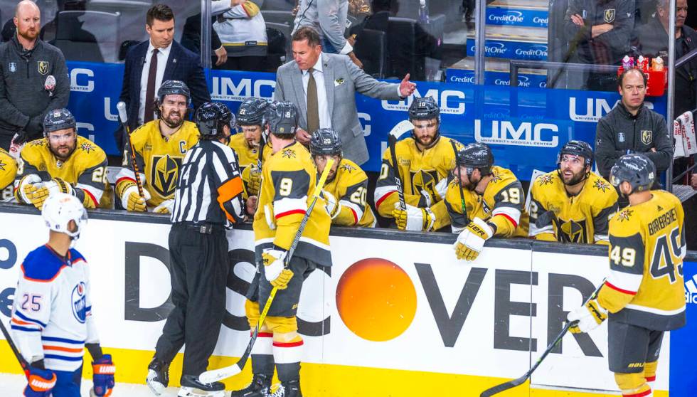 Golden Knights head coach Bruce Cassidy argues another penalty call as they battle the Edmonton ...