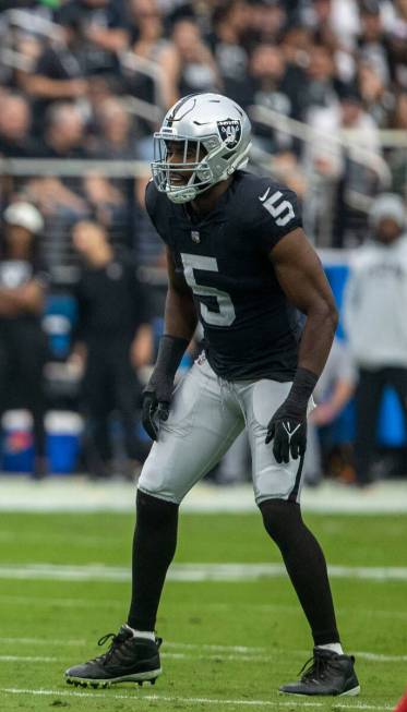 Raiders linebacker Divine Deablo (5) stays in coverage during the first half of an NFL game aga ...