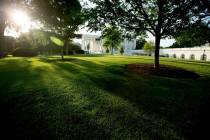 FILE - Int his June 11, 2016, file photo, the sun rises over the White House in Washington. It& ...