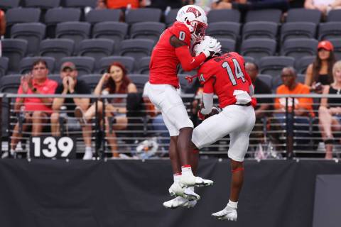 UNLV Rebels wide receiver Zyell Griffin (14) celebrates his touchdown with UNLV Rebels wide rec ...