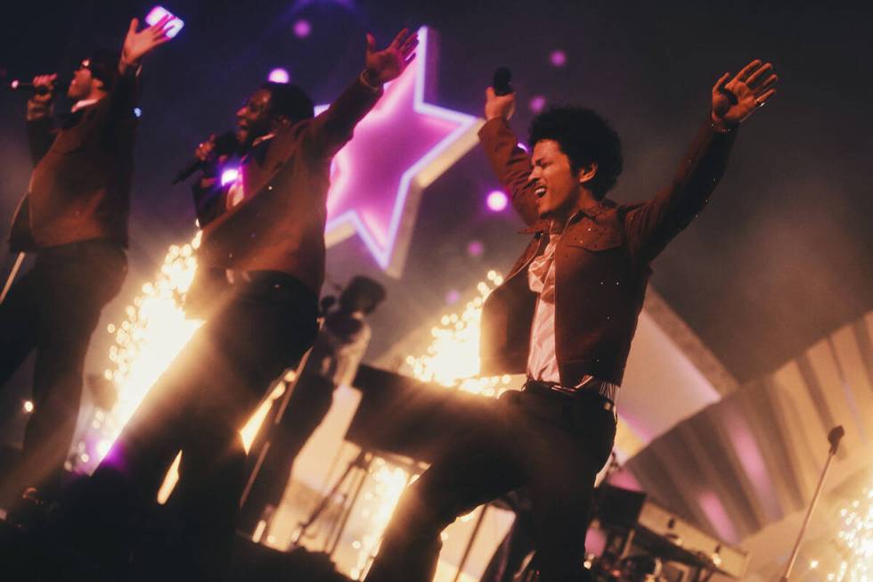 Bruno Mars and Anderson .Paak are shown in their Silk Sonic residency production at Dolby Live ...