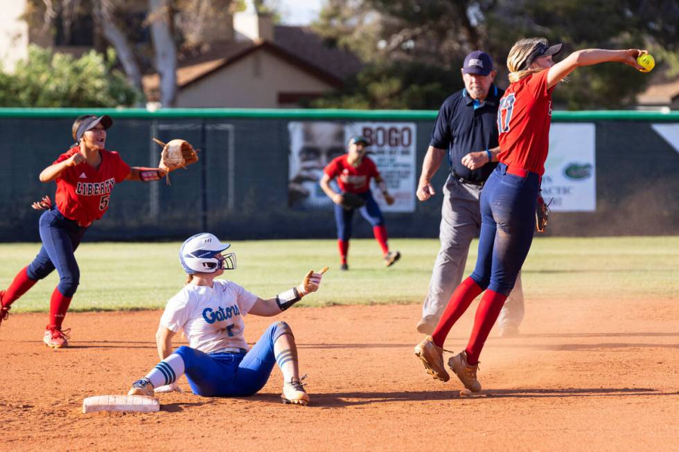 Liberty High's Jesse Farrell (17) and her teammate Jaydah Chun (50) celebrate after Farrell tag ...