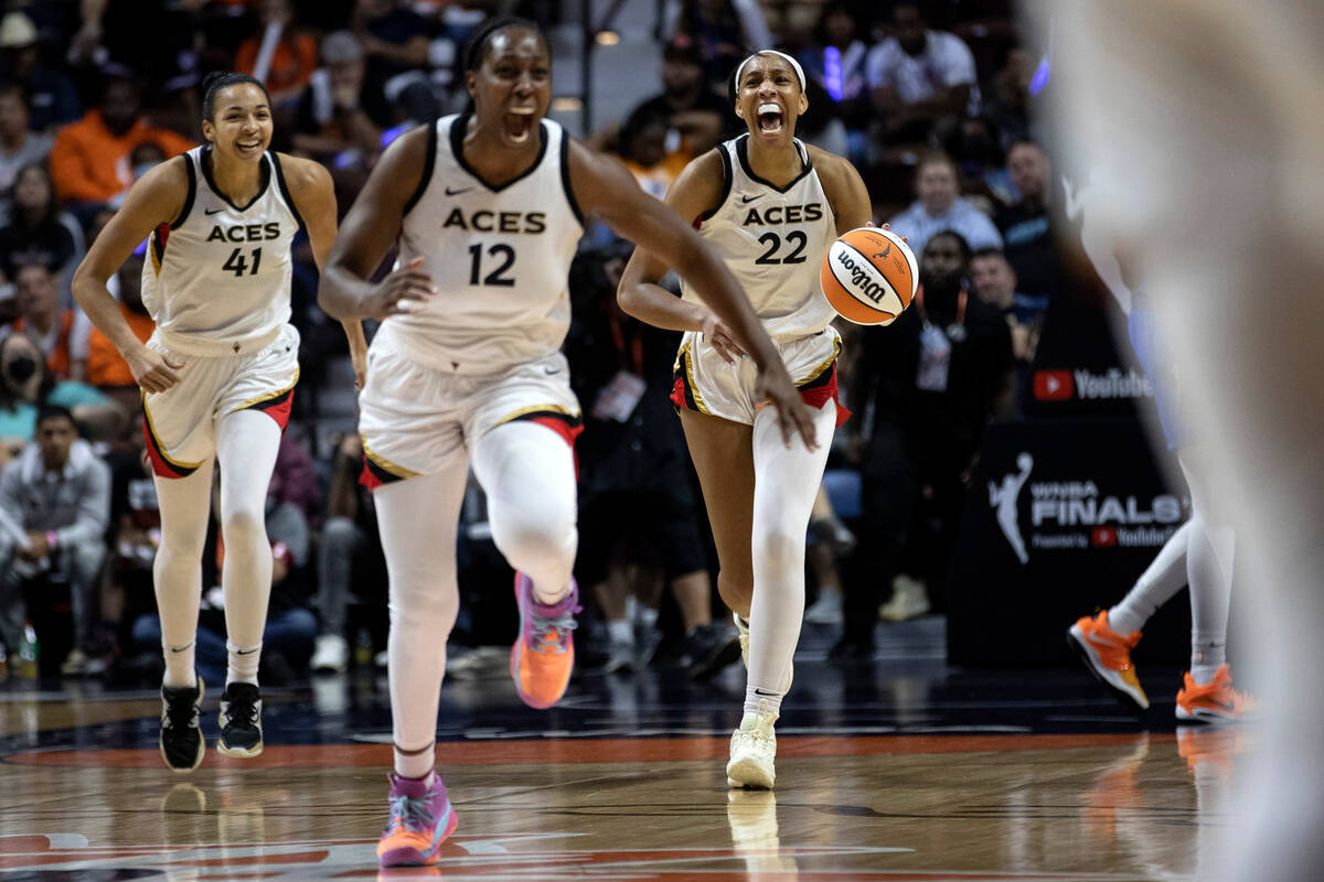 Las Vegas Aces starters Kiah Stokes (41), Chelsea Gray (12) and A’ja Wilson (41) run tow ...