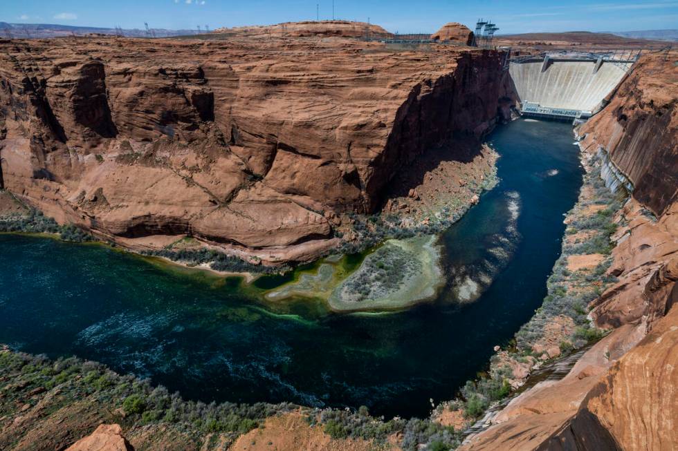 The Colorado River flows below the Glen Canyon Dam on April 18, 2023, in Page, Arizona. (L.E. B ...