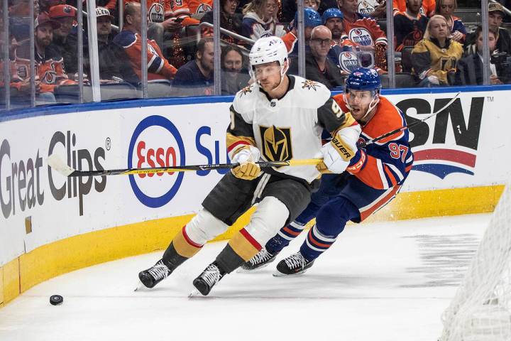 Vegas Golden Knights Jack Eichel (9) is chased by Edmonton Oilers' Connor McDavid (97) during t ...