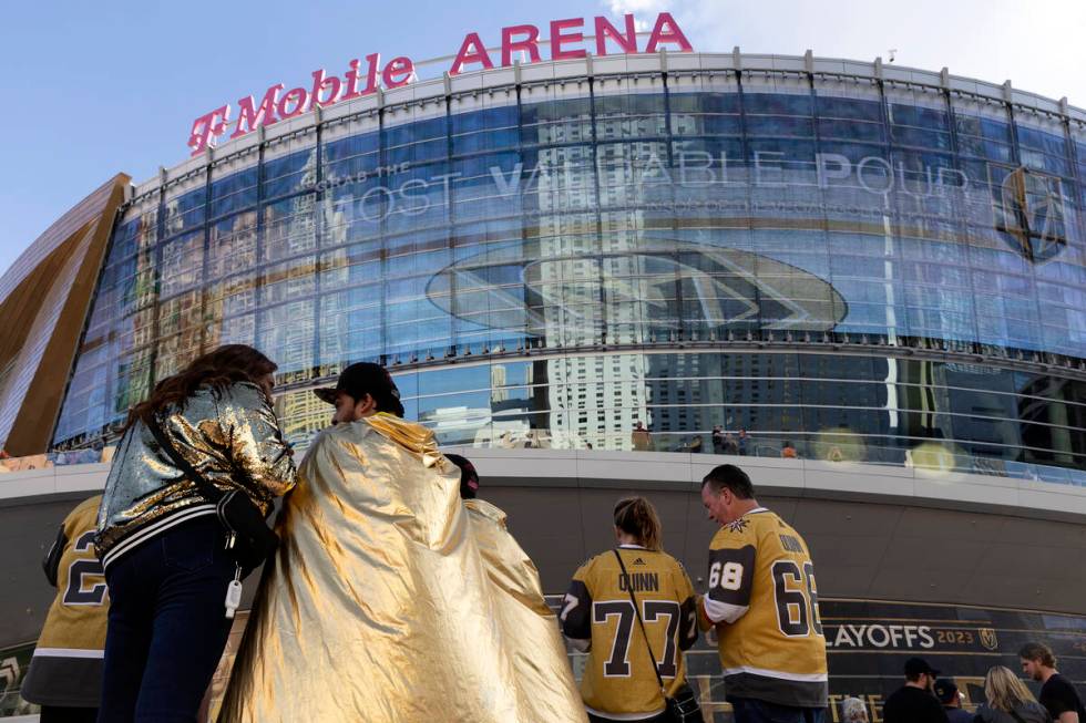 Golden Knights fans wear golden clothing before Game 5 of an NHL hockey Stanley Cup second-roun ...