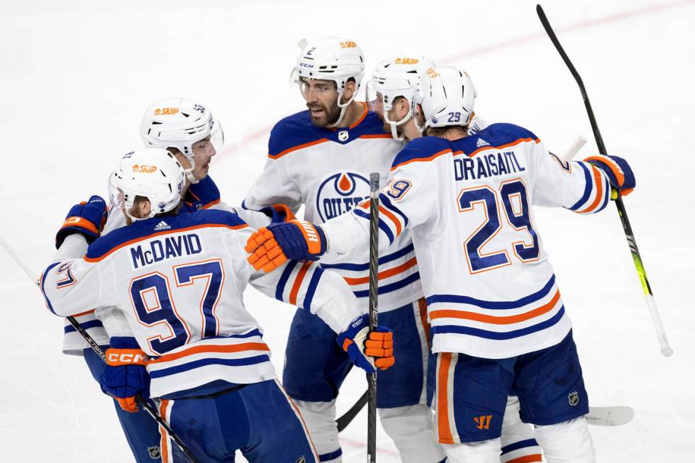 The Edmonton Oilers celebrate after center Connor McDavid (97) scored during the first period i ...
