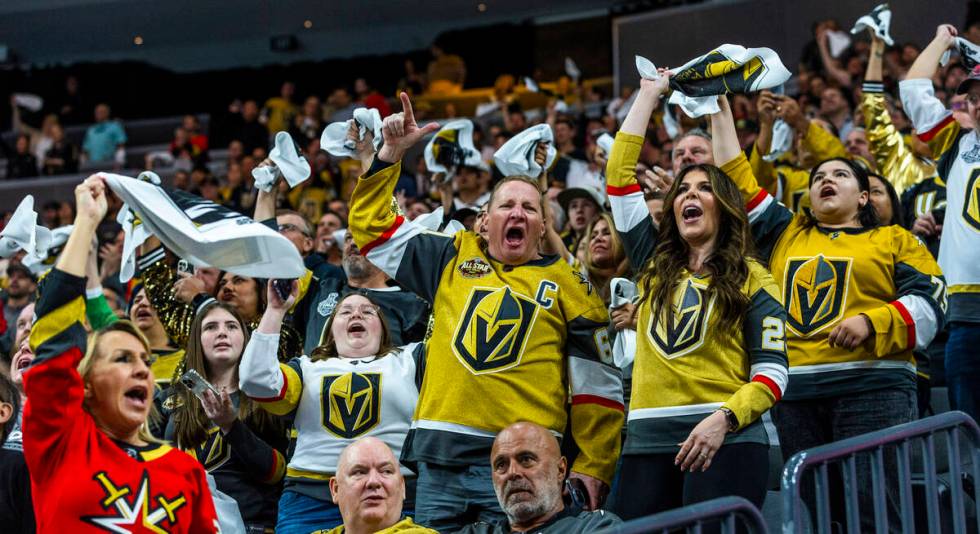 Golden Knights fans celebrate a goal against the Edmonton Oilers during the first period in Gam ...