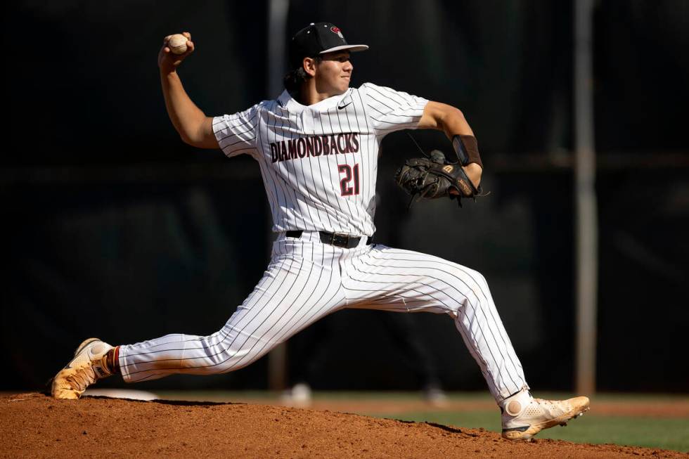 Desert Oasis pitcher Tyler Kennedy throws to Basic during a high school Class 5A Southern Regio ...