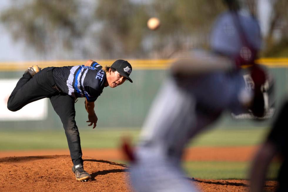 Basic’s Tee Southisene throws to Desert Oasis during a high school Class 5A Southern Reg ...