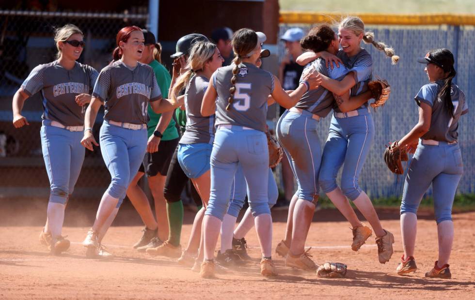 Centennial players celebrate beating Palo Verde 11-7 their Class 5A Southern Region softball ti ...