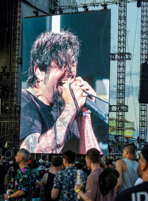 Deftones lead singer Chino Moreno performs with the band during the Sick New World festival at ...