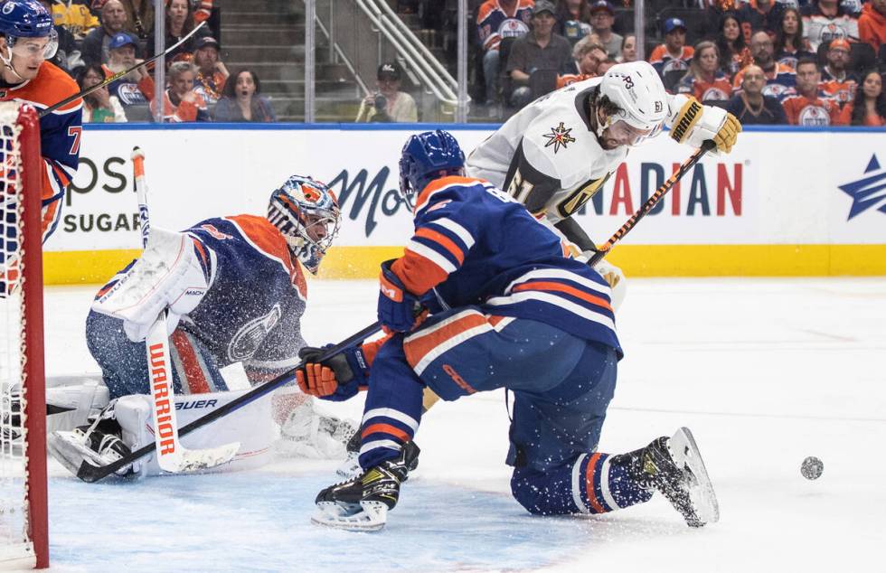 Vegas Golden Knights' Mark Stone (61) is stopped by Edmonton Oilers goalie Jack Campbell (36) a ...