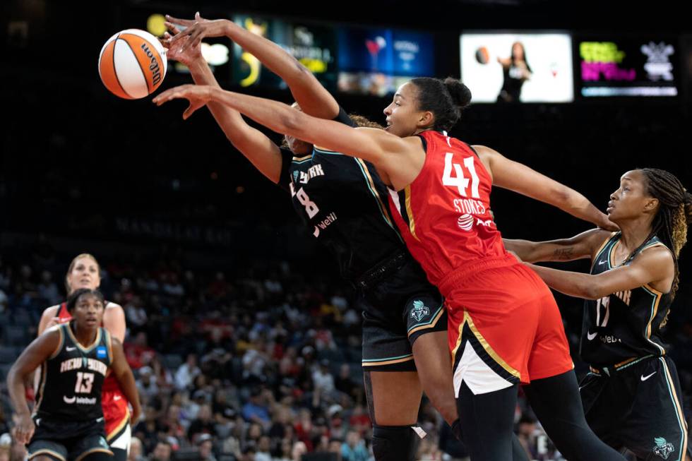 Aces center Kiah Stokes (41) blocks a shot by New York Liberty forward Nyara Sabally (8) while ...