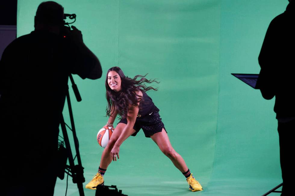 Las Vegas Aces guard Kelsey Plum performs during filming on their media day, Monday, May 15, 20 ...