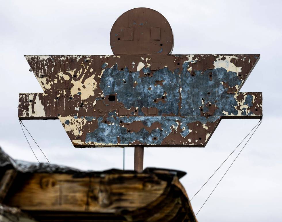 A peeling, metal sign above a former business along West Bonanza Road on Tuesday, March 21, 202 ...