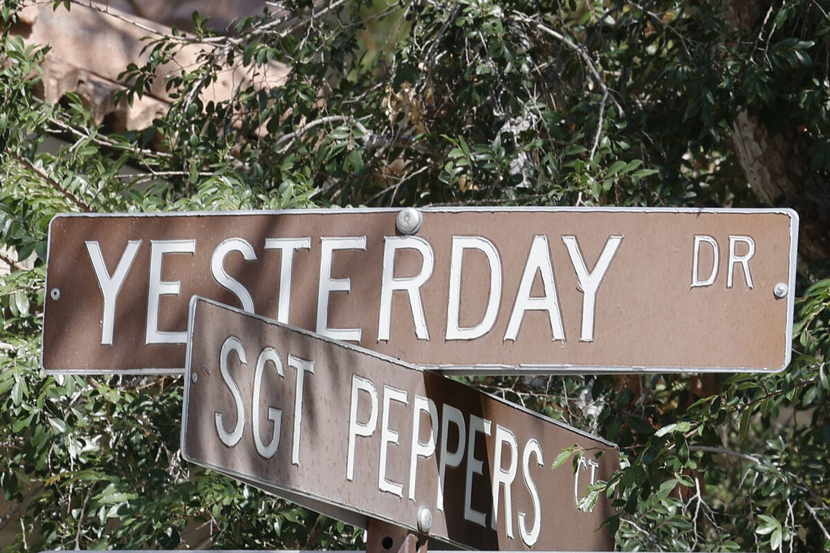 Street signs for Yesterday Drive and Sgt Peppers Court are seen, Wednesday, May 24, 2023, in He ...
