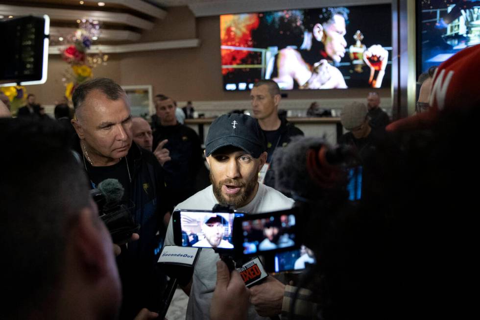 Vasily Lomachenko speaks to the press after arriving to MGM Grand ahead of his Saturday night u ...