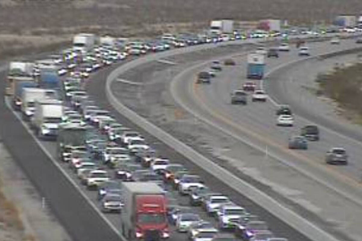 This picture taken from video shows traffic backed up on Interstate 15 southbound near Primm on ...