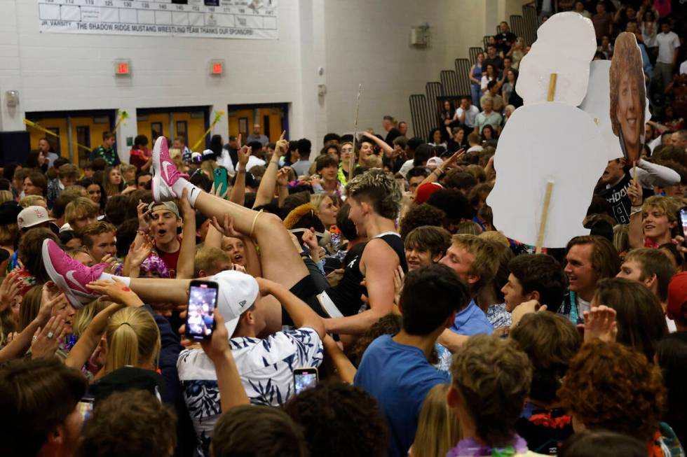 Shadow Ridge's Tyler Kirk (7) is crowd-surfed during the celebration of their victory against P ...